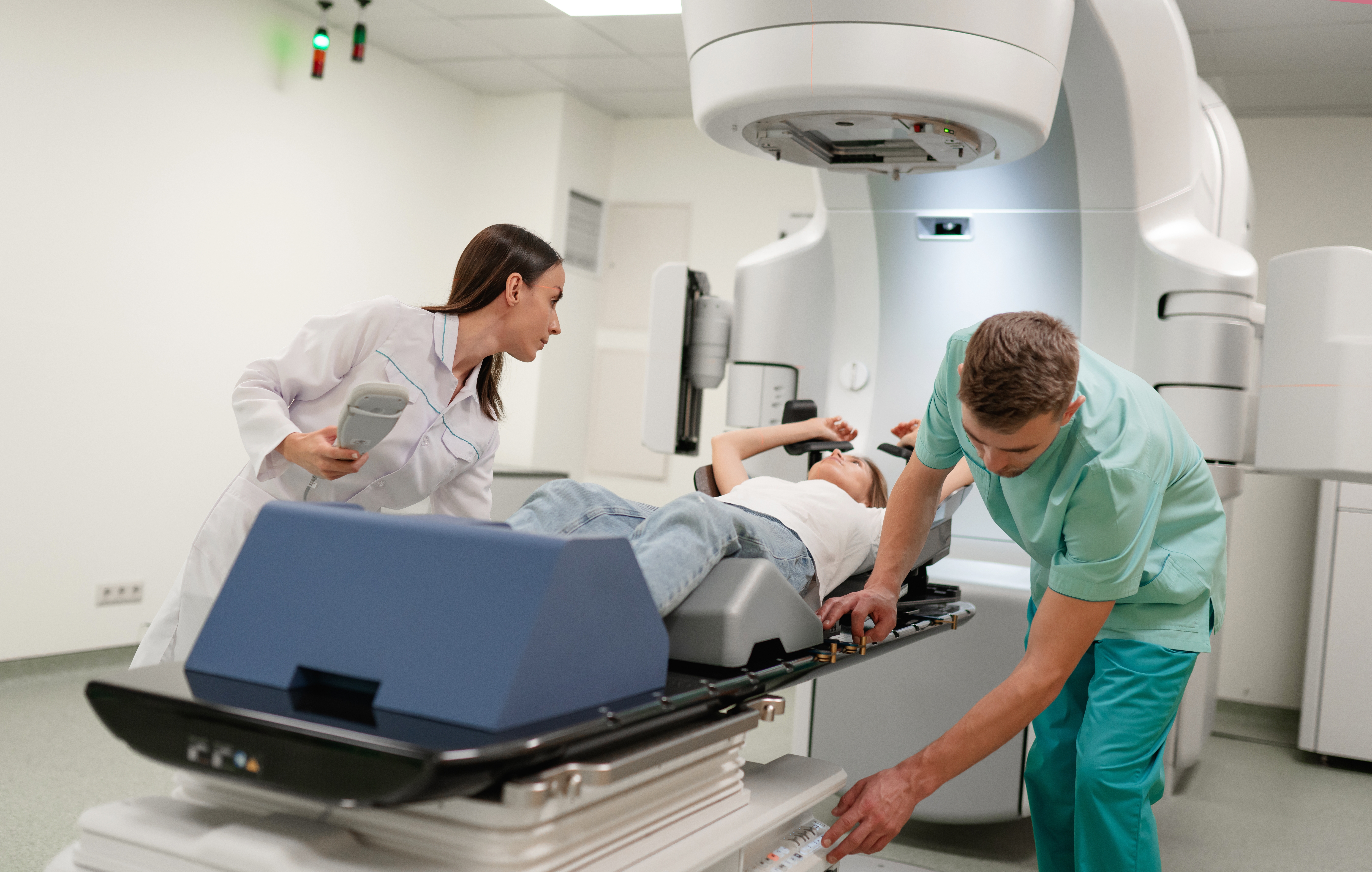 two,healthcare,professionals,prepare,patient,for,radiotherapy,treatment,using,linear