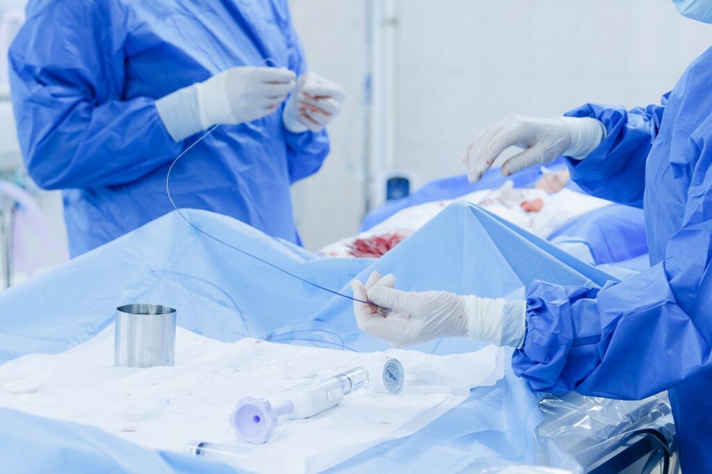 cardiac,catheterization,operating,room,scene,with,surgical,team,and,sterile