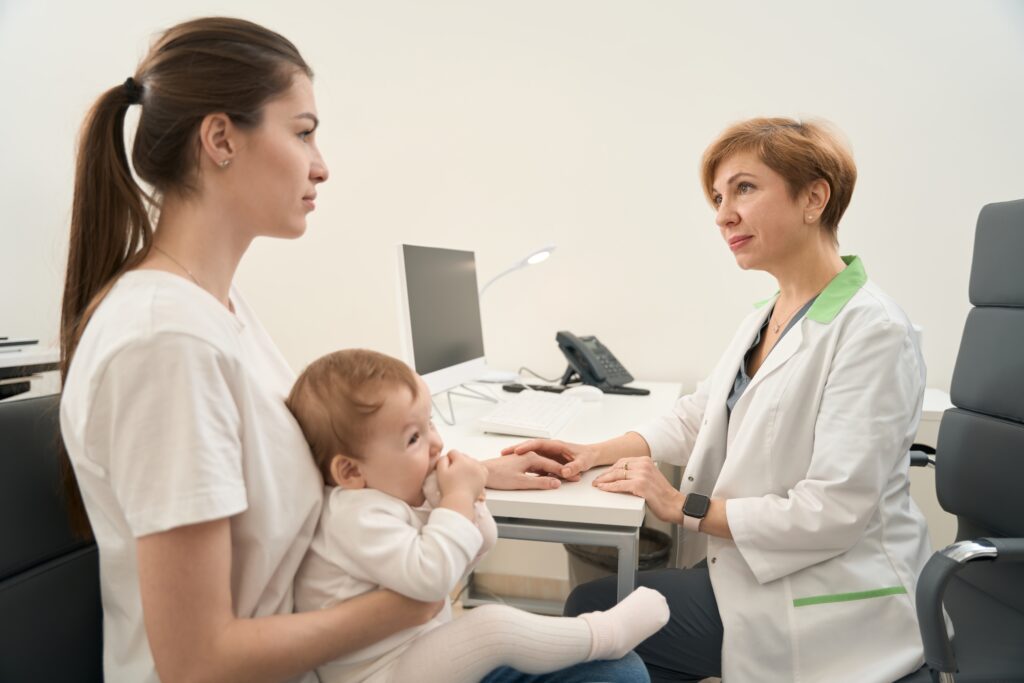 pediatric,oculist,soothing,female,after,baby,examination