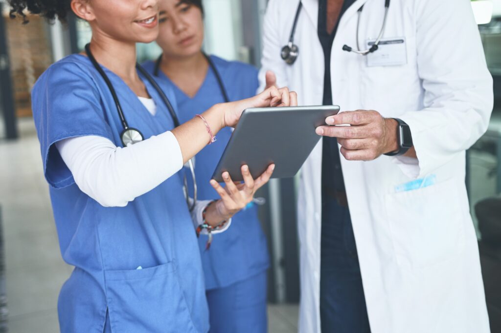 hands,,tablet,and,meeting,with,people,in,hospital,for,medical
