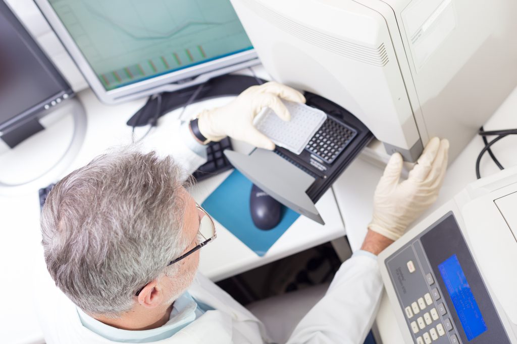 life,science,researcher,performing,a,genotyping,testing,which,enables,personalized