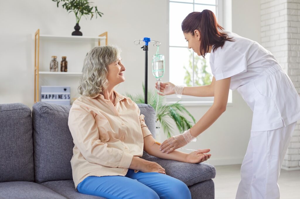 friendly,young,female,medical,nurse,helping,senior,elderly,woman,patient